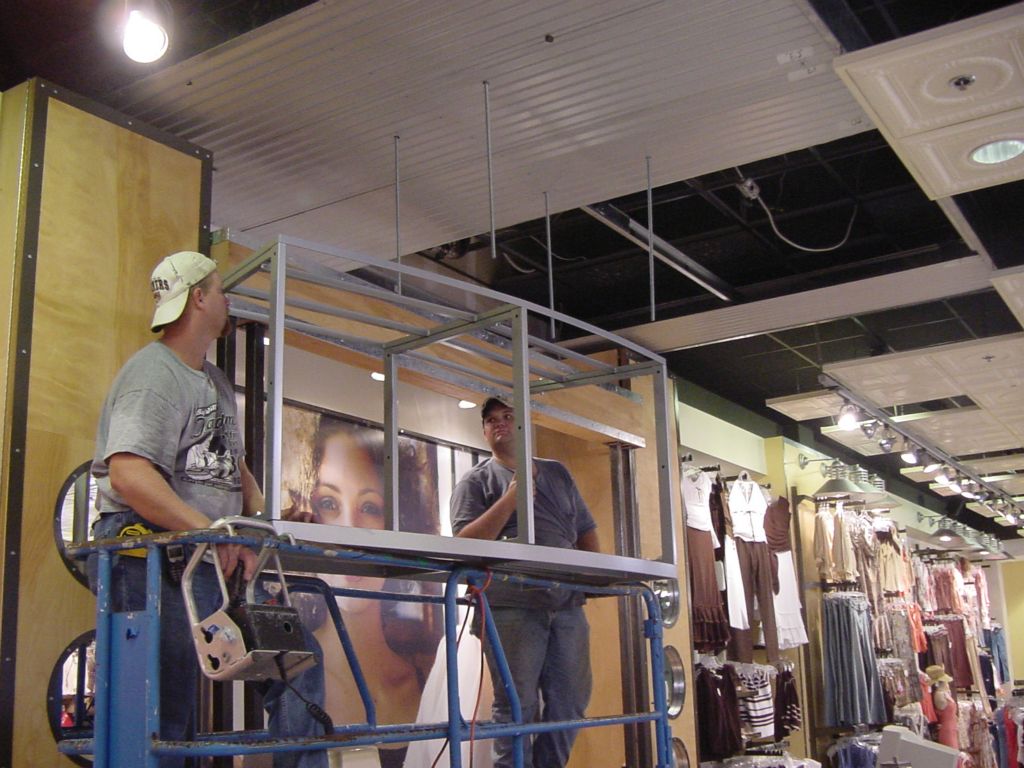 ALIGNING THE STRUCTURAL CAGE WITH THE ALL THREAD RODS